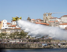 Aerial Firefighter Drops Water On Douro River