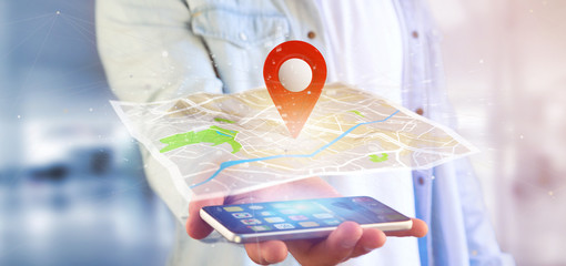 Poster - Man holding a 3d rendering pin holder on a map