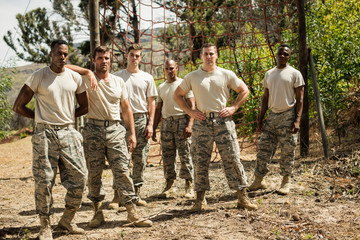 Wall Mural - Military soldiers standing near fitness trial