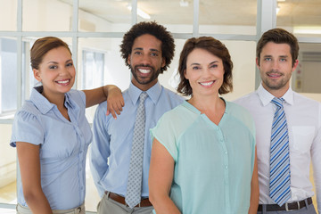 Portrait of smiling business people in office