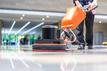 Sticker - cleaning floor with machine