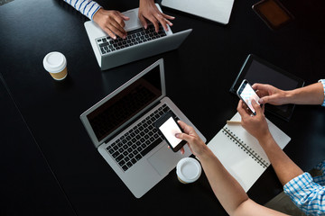 Aufkleber - Man and women using mobile phone and laptop