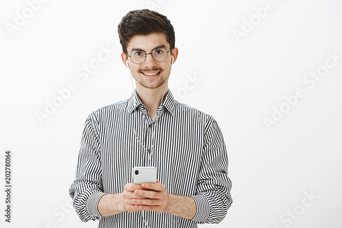Guy Taking Notes While Listening Audiobook Portrait Of Friendly