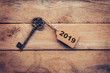 Business concept old key vintage with tag for New Year Resolution 2019.