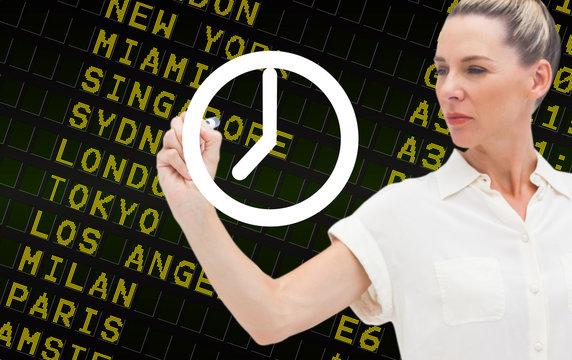 Composite image of business person drawing a white clock