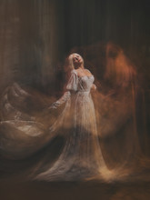 The Legend Of The Banshee Fairy. Pale Girl Blonde, Like A Ghost, In A White Vintage Dress, Flies, Hovers In Space. Branch Of The Soul. Light Angel. Gothic, Art Photo Of The Sorceress And The Magician