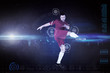 © vectorfusionart - Football player in red kicking against blue dots on black background