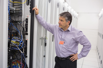 Poster - Technician trying to repair the server