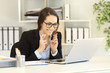 © Antonioguillem - Hopeful businesswoman waiting for online news