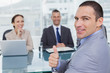 © WavebreakmediaMicro - Applicant giving thumb up after obtaining the job