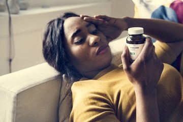 Wall Mural - Black woman headache and sleeping