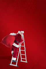 Wall Mural - Santa steps up a ladder against red background