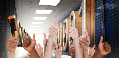 Poster - Hands showing thumbs up against 3d binary code in data center hallway
