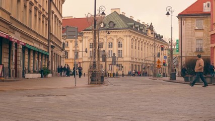 Poster - Warsaw, Poland- December 26, 2017 People walk down the street in the old town. time-lapse