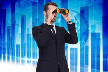 Sticker - Elegant businessman standing and using binoculars  against global business graphic in blue