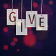 Give typography greeting card with blurred bokeh lights in the background.