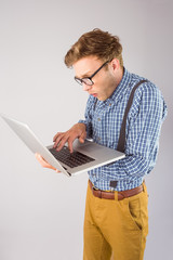 Poster - Geeky businessman using his laptop