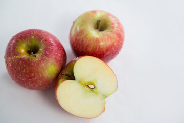 Wall Mural - Red apples with water droplets