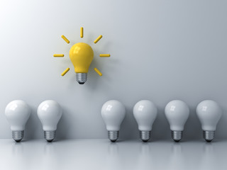 Fototapete - Think different concept , One yellow idea light bulb standing out from the white unlit bulbs with window reflections and shadows, leadership and individuality creative idea concepts . 3D rendering.
