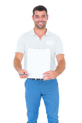 Poster - Delivery man giving clipboard for signature on white background