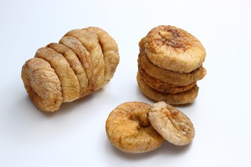 Poster - A few dried figs on white background closeup