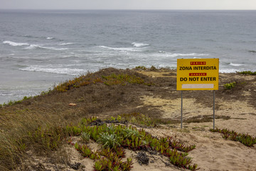 warning sign on a beach