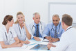 © WavebreakmediaMicro - Team of doctors having a meeting
