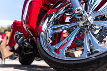 Motorcycle Close-up. Detail Of A Beautiful Powerful Chrome Motorcycle Wheels. The Concept Of Freedom And Travel. Custom Works. Metallic Shiny New Internal Combustion Engine