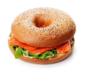 Wall Mural - single bagel sandwich with salmon, cream cheese and arugula isolated on white background