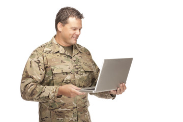 Wall Mural - U.S. Army Soldier, Sergeant. Isolated with computer laptop.