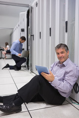 Aufkleber - Technician working on the floor with tablet pc