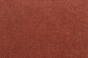 Background of brown fabric of artificial flax