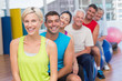 © WavebreakmediaMicro - People relaxing on exercise balls in gym class