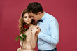 © SHOTPRIME STUDIO - young couple with rose on a pink background
