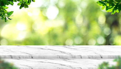 Aufkleber - Empty white marble table top with blur tree in park with bokeh light at background,Mock up template for display of your design,Banner for advertise of product,panorama view