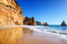 Beautiful Sea View With Secret Sandy Beach Among Rocks And Cliffs In Algarve, Portugal