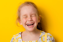 Cheerful Girl Laughs