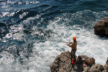 Man Fishing Near Monaco