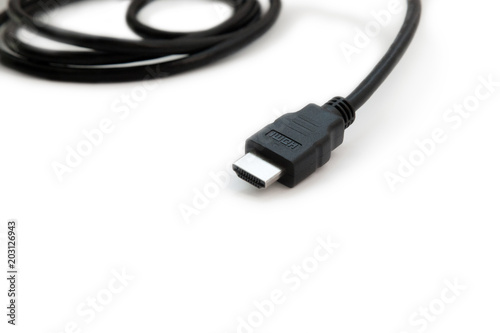 Valokuva Black HDMI cable on white background. Connector close-up.
