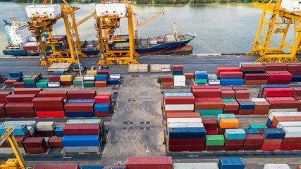 Logistics and transportation of Container Cargo ship and Cargo plane with working crane bridge in shipyard at sunrise, logistic import export and transport industry background