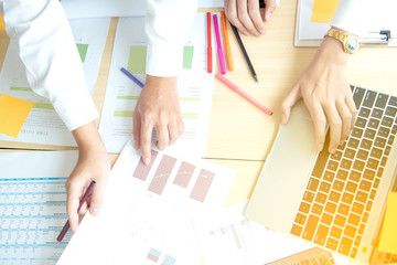 business group working check chart and paper data with laptop on desk in office