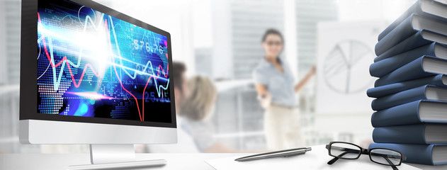 Poster - Computer screen against stocks and shares on black background