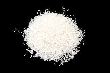 Wall Mural - a bunch of white rice isolated on a black background. Chinese cuisine. Traditional food concept..