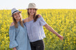© Miller_Eszter - Beautiful young women wearing hat on the colza field