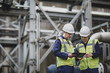© ReeldealHD images - Industrial workers using a digital tablet on site
