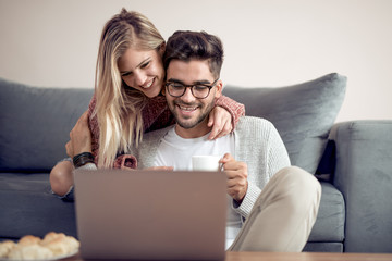 Poster - Couple surfing together