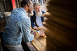 © Connect Images - Vendor taking food orders from customer