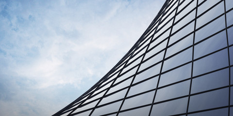 Poster - View of the clouds reflected in the curve glass office building. 3d rendering