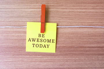 Wall Mural - Inspirational quote - Be more awesome today on paper hanging by clothespins