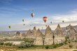 © Nataliia Vyshneva - Bright multi-colored hot air balloons flying in sunsrise sky Cappadocia, Turkey